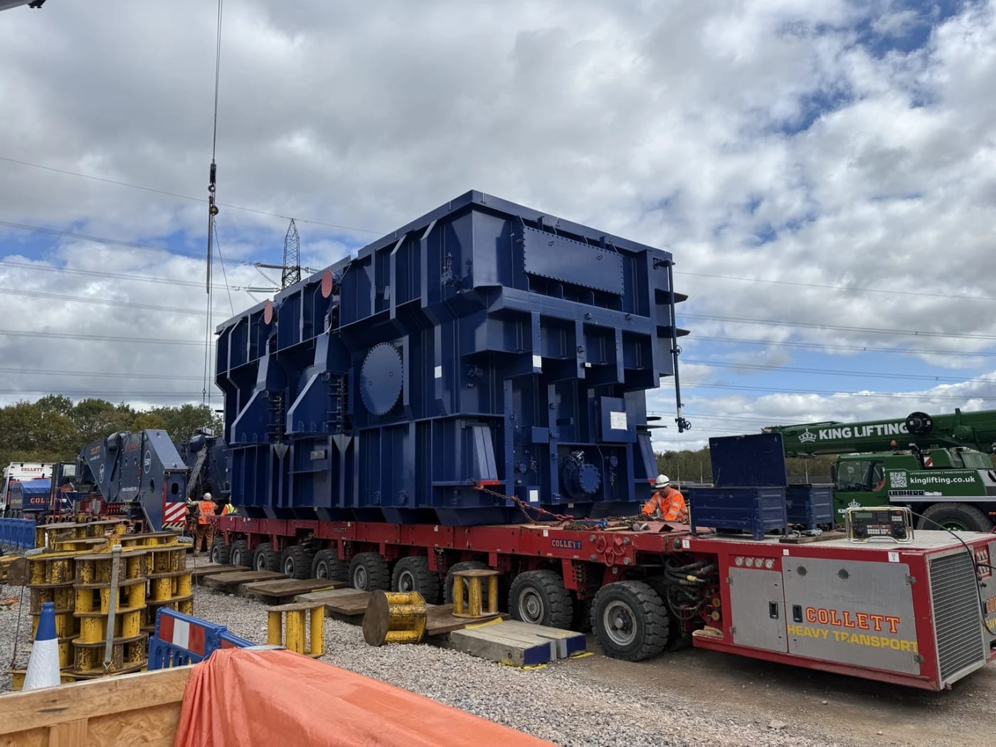 A 300 tonne super grid transformer under move on self propelled modular transporters.